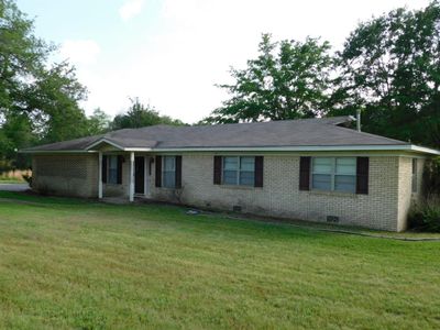 Ranch-style house featuring a front lawn | Image 2