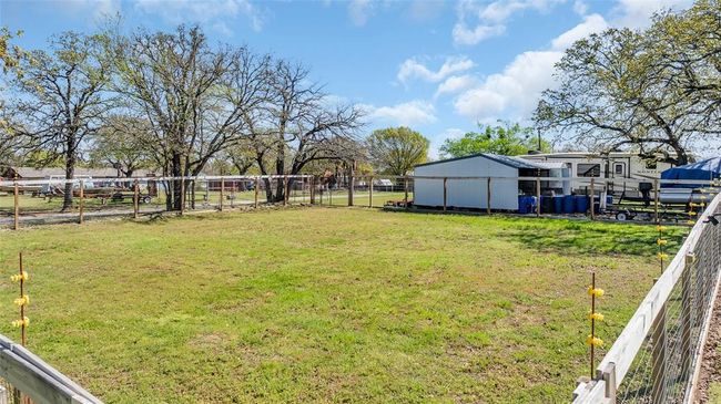 View of yard with fence | Image 8