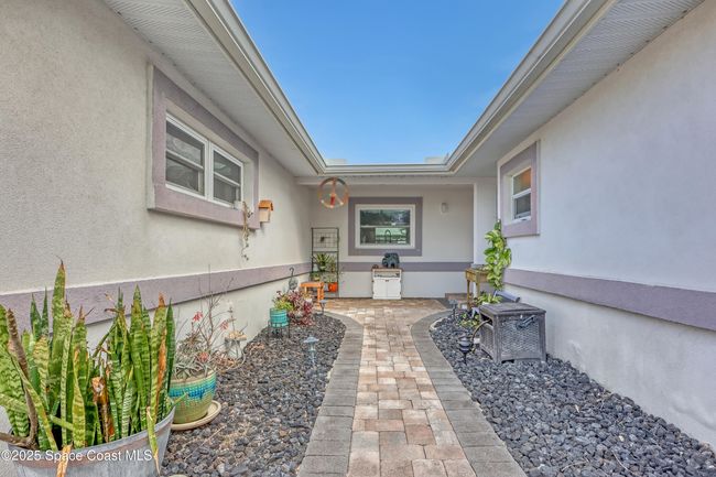 1061 Bali Rd, House other with 4 bedrooms, 2 bathrooms and null parking in Cocoa Beach FL | Image 6
