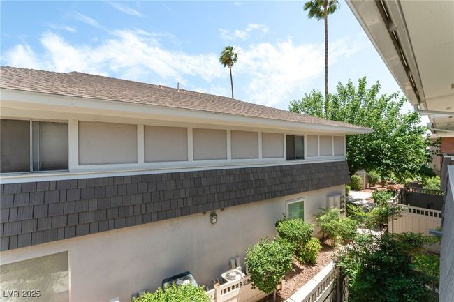 View of property exterior featuring stucco siding | Image 25