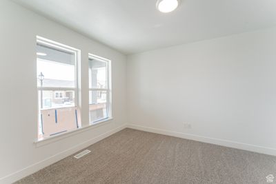 Unfurnished room featuring carpet floors | Image 2