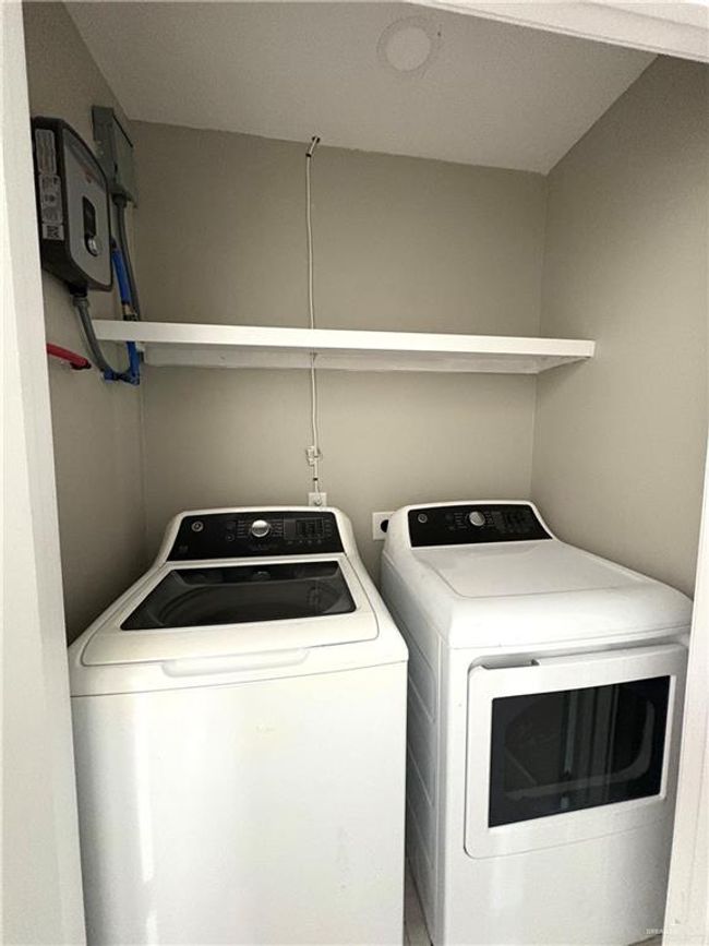 Washroom featuring independent washer and dryer | Image 5