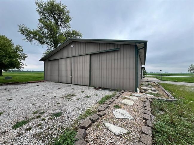 Oversized shed doors allow for entry of large machinery | Image 13