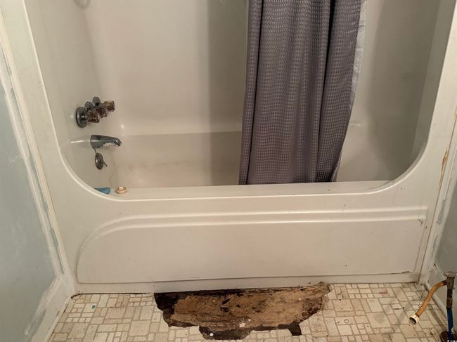 Full bath with shower / tub combo and brick patterned flooring | Image 17