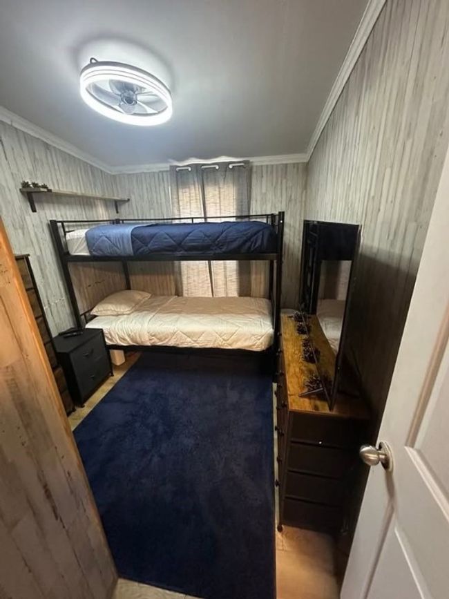 Bedroom featuring crown molding | Image 10