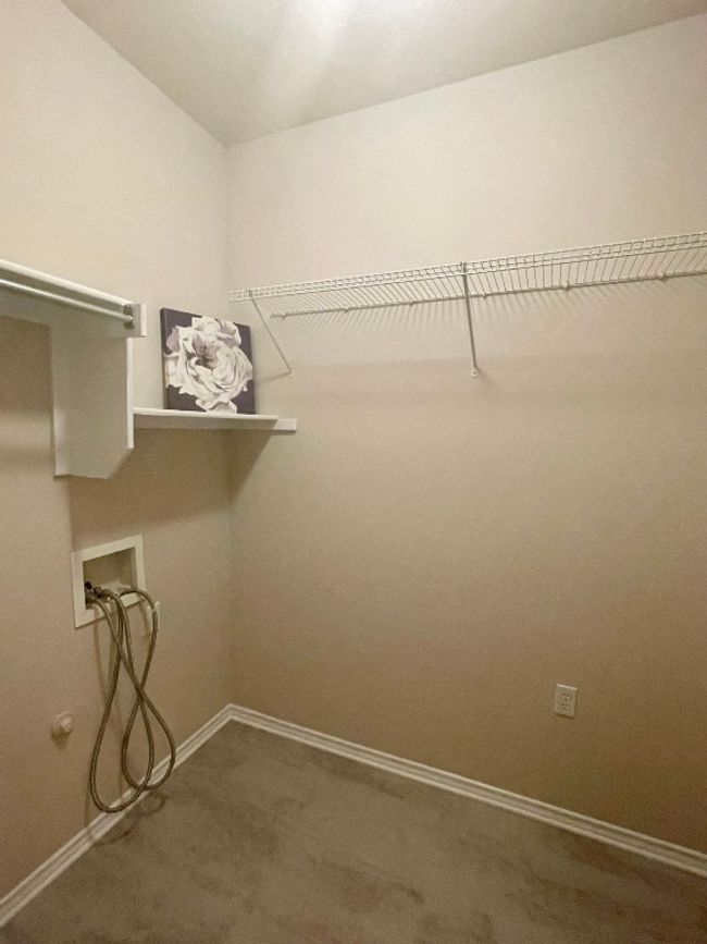 Walk in closet with carpet flooring | Image 14