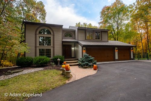 7750 Sun Quest Ridge Drive Ne, Ada Township, MI, 49301 | Card Image