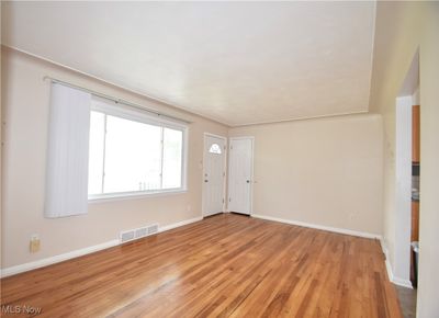 Living room featuring light hardwood / wood-style floors | Image 3