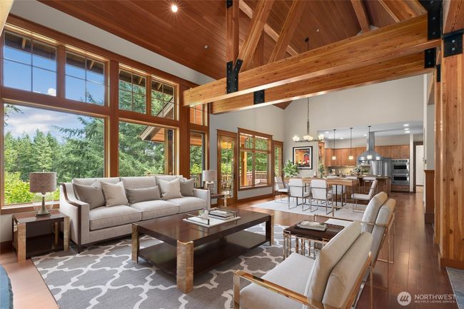 Virtually Staged Open living concept with New Brazilin cherry wood floors. Leads into the dining room area and out to a great covered deck. | Image 7