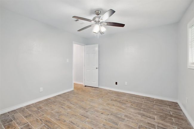 Flexible and functional, these rooms are move-in ready with energy-efficient ceiling fans and tile flooring. | Image 30