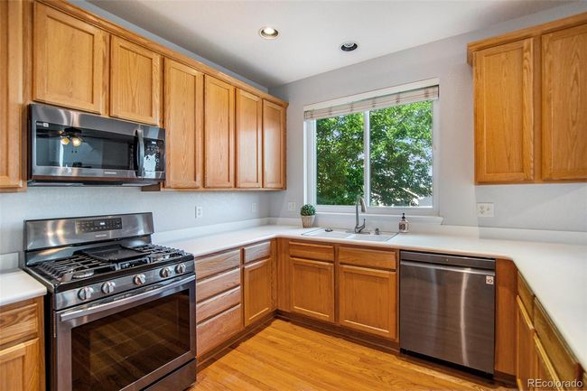 Kitchen with Black stainless steel LG and Samsung appliances | Image 9