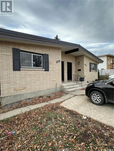 312 Macdonald Dr, Home with 4 bedrooms, 2 bathrooms and null parking in Swift Current SK | Image 1