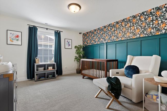 Carpeted bedroom with visible vents and baseboards | Image 24
