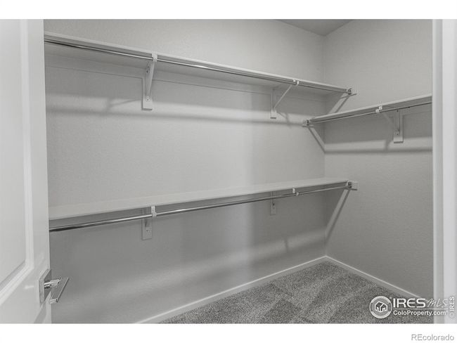 MASTER BEDROOM WALK IN CLOSET | Image 26
