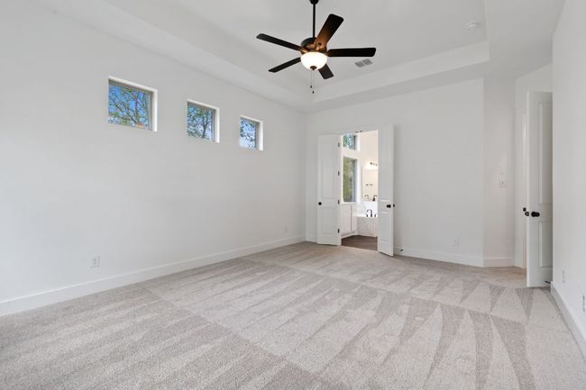 Primary Bedroom with tray ceiling | Image 20