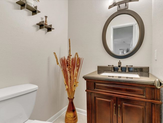 Half bathroom with toilet and vanity | Image 18