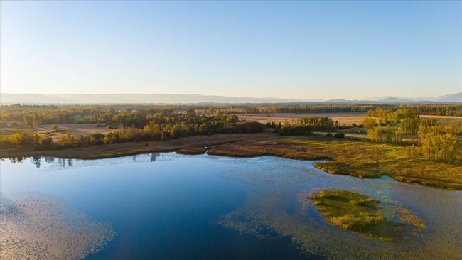 Birds eye view of property with a water and mountain view | Image 52
