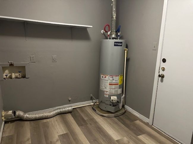 Utilities featuring gas water heater | Image 5