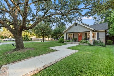 Updated Craftsman, sitting on a corner lot with gorgeous live oak trees! | Image 1