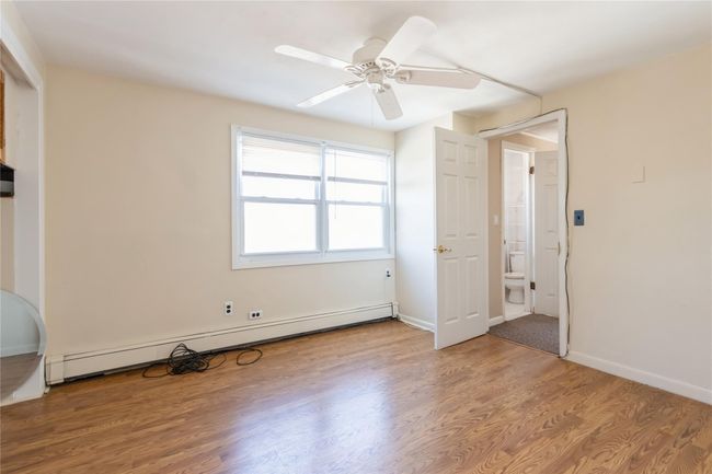 Another view of the third bedroom. | Image 18