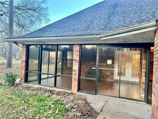 Glassed-in porch / sunroom from exterior | Image 8