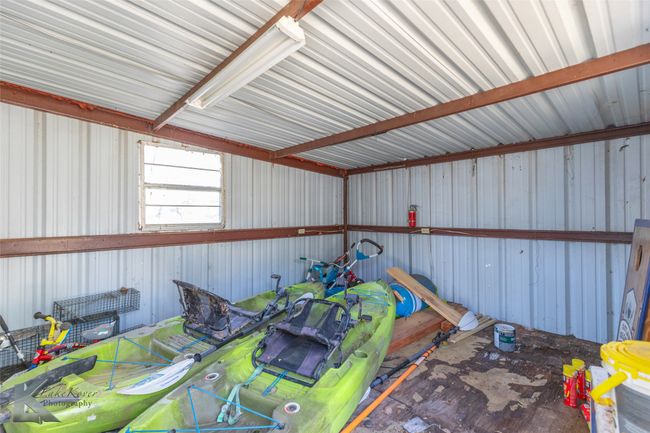 Garage with metal wall | Image 11