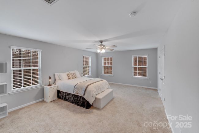 Spacious Owners Suite overlooking tree lined rear yard! | Image 25