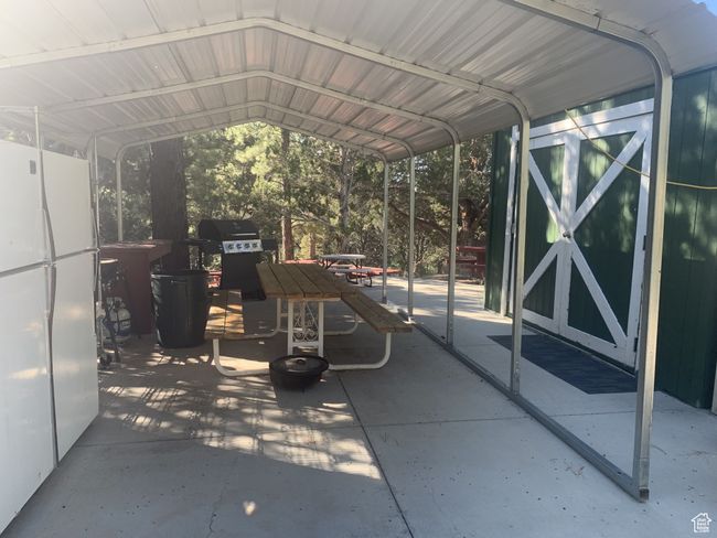 View of patio / terrace with a carport | Image 24