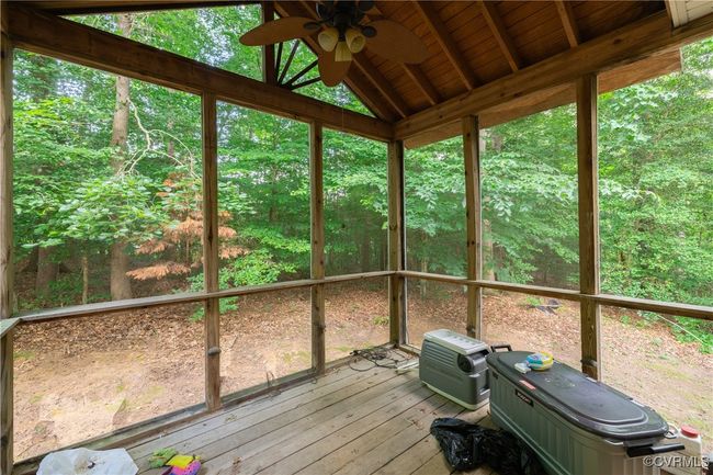 Unfurnished sunroom with a ceiling fan | Image 20