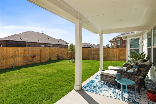 View of yard featuring a patio area and a fenced backyard | Image 28