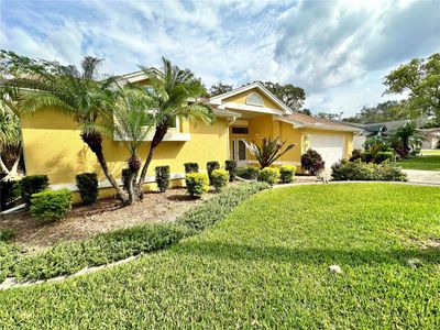 8215 Golf Club Court, House other with 3 bedrooms, 2 bathrooms and null parking in Hudson FL | Image 2