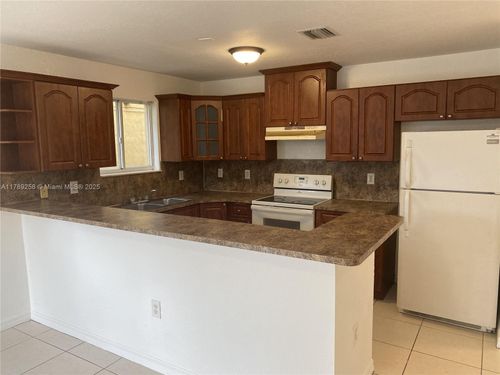 u-7010 Nw 6th Ct, Miami, FL, 33150-3808 | Card Image