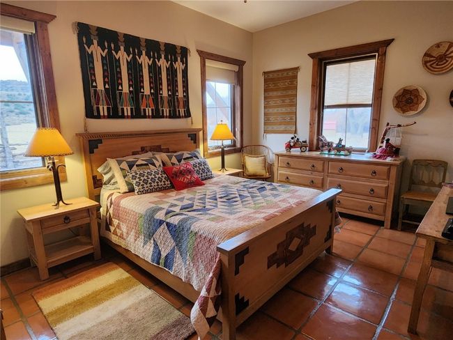 View of tiled bedroom | Image 13