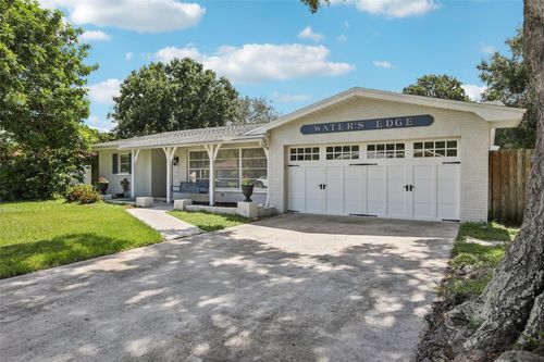 1317 Ranchwood Dr E, DUNEDIN, FL, 34698-4821 | Card Image