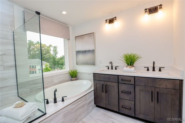 VIRTUAL STAGING. Photo represents the plan with virtual staging. Luxurious primary suite. | Image 21