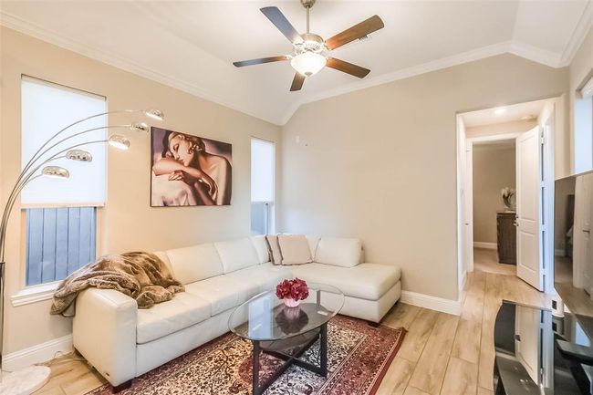 The separate guest suite feels just like home (or better!). With a large living area, guests feel right at home. Enter through the lockable door between the two spaces or from its own separate entrance. | Image 18