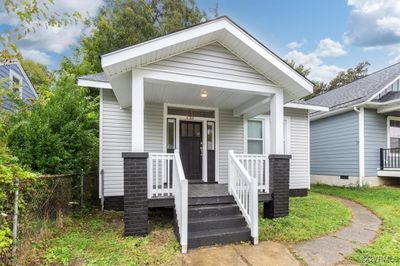 Bungalow featuring covered porch | Image 2