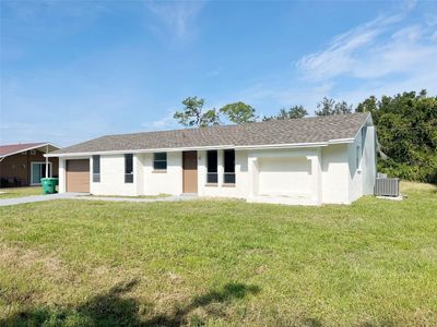 944 Tropical Avenue Nw, House other with 4 bedrooms, 2 bathrooms and null parking in Port Charlotte FL | Image 1