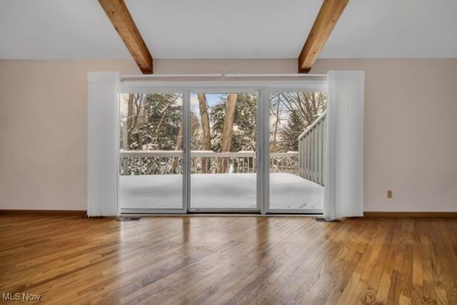 Triple sliding door to deck off great room. Beautiful view! | Image 14