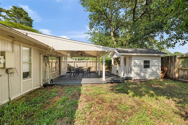 The large backyard and deck offer plenty of space to spread out, entertain, or create your own private retreat—imagine the possibilities. | Image 18