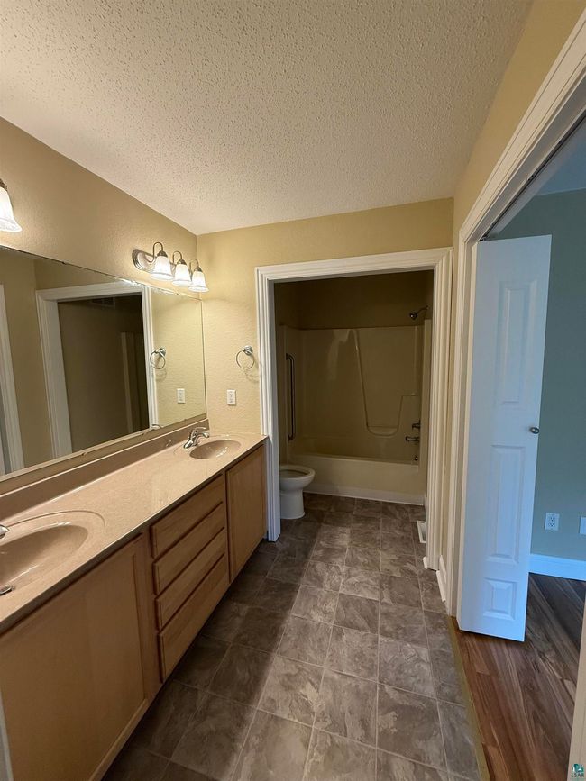 LEFT - 5282 Twin Pnes, House other with 4 bedrooms, 3 bathrooms and null parking in Hermantown MN | Image 12