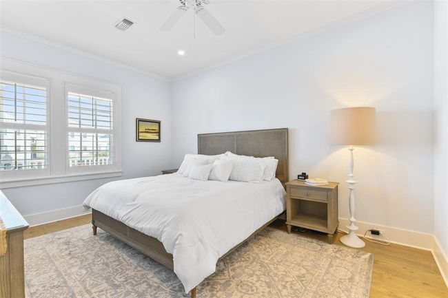 Primary bedroom suite. All rooms feature window treatments, crown moulding, and tall base boards. | Image 25