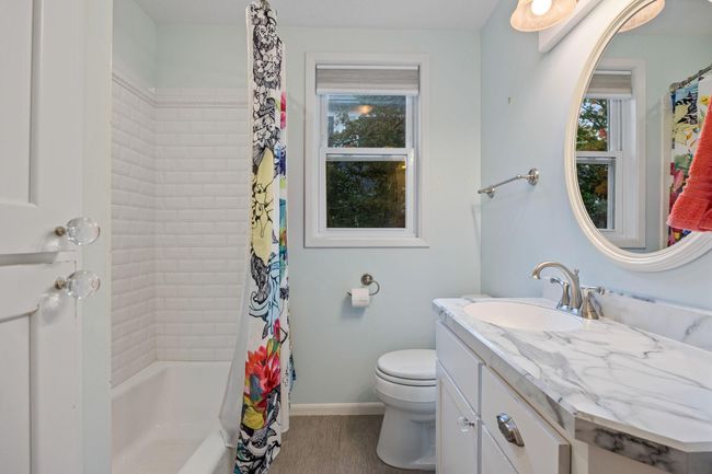 This one is a main floor full bath, with a really nice vanity. | Image 14