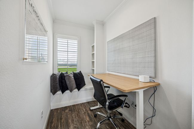 Office area with ornamental molding and wood finished floors | Image 8