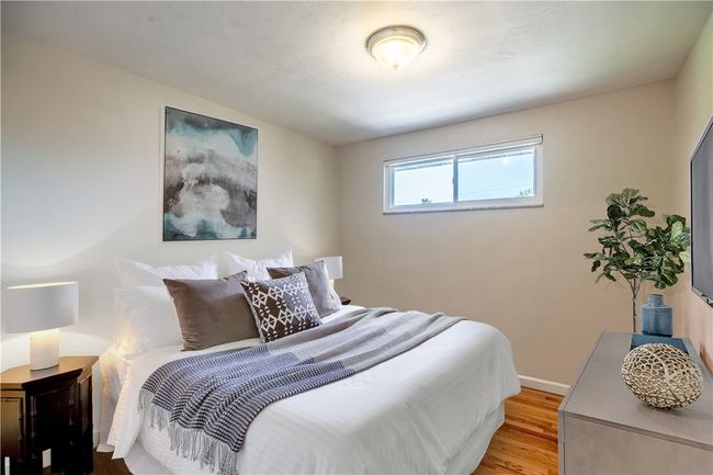 Digitally staged view of the 2nd bedroom. | Image 16