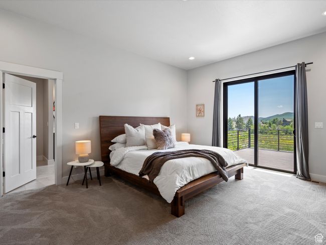 Bedroom with access to outside, carpet floors, baseboards, and recessed lighting | Image 24