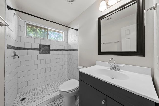 Full bath with vanity and a shower stall & bidet | Image 10