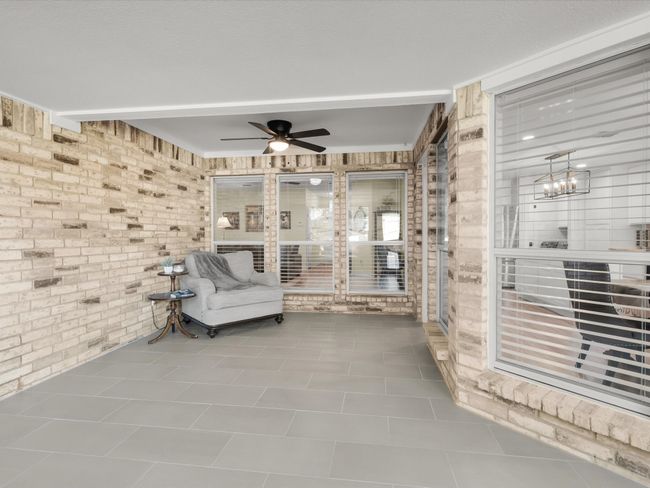 View of patio / terrace with ceiling fan | Image 19