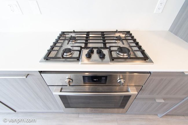 Kitchen view of appliances with stainless steel finishes | Image 14