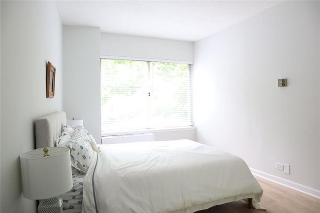 Bedroom featuring hardwood / wood-style floors | Image 7